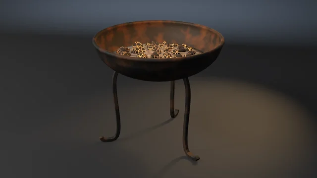 An iron fire bowl with a rolled rim on three S-curved forged legs with curled feet, filled with ash and a heap of charcoal glowing orange in its cracks.