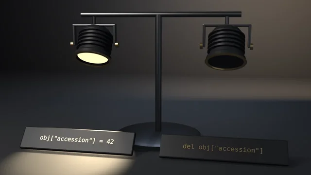 Two stage lamps on one stand: the left, still carrying its ID property, glows over a placard reading obj["accession"] = 42; the right, after del obj["accession"], stands dark.