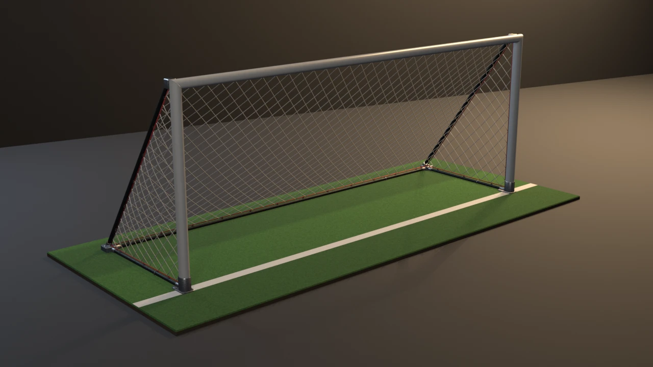A white youth soccer goal on a turf patch with a painted goal line, seen at three-quarter: mitred posts and crossbar, sloped rear supports and a sagging diamond-mesh net edged in red rope.